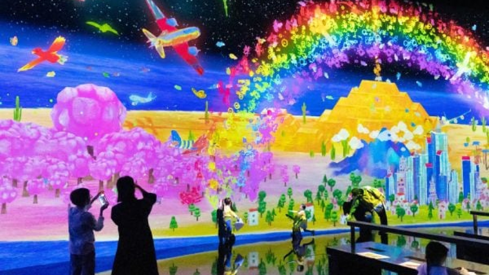 Digital light canvas attractions in singapore marina bay sands